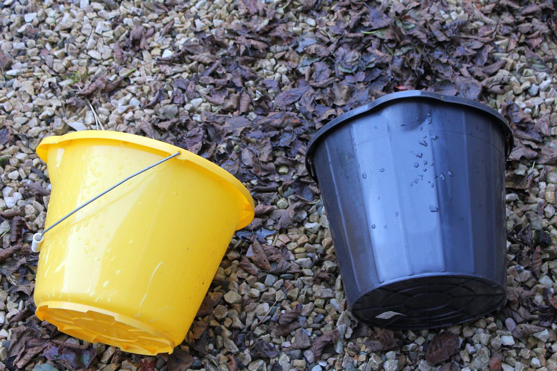 An image of two buckets, side by side.